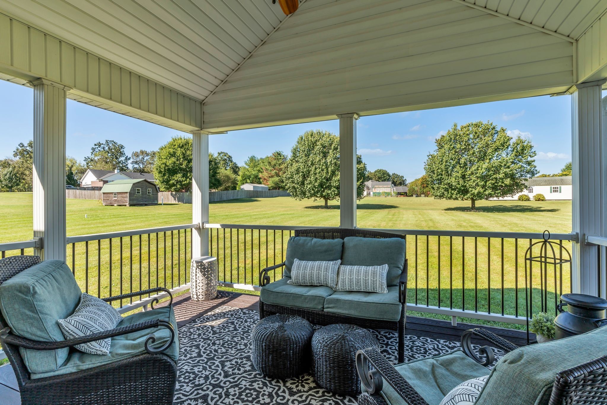 1688 Porter Road Bon Aqua, TN 37025 - Photo 28 of 38 a balcony with furniture and a garden
