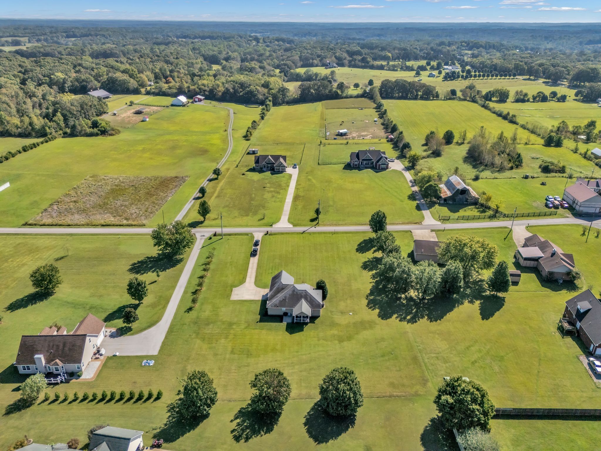 1688 Porter Road Bon Aqua, TN 37025 - Photo 35 of 38 an aerial view of residential houses with outdoor space