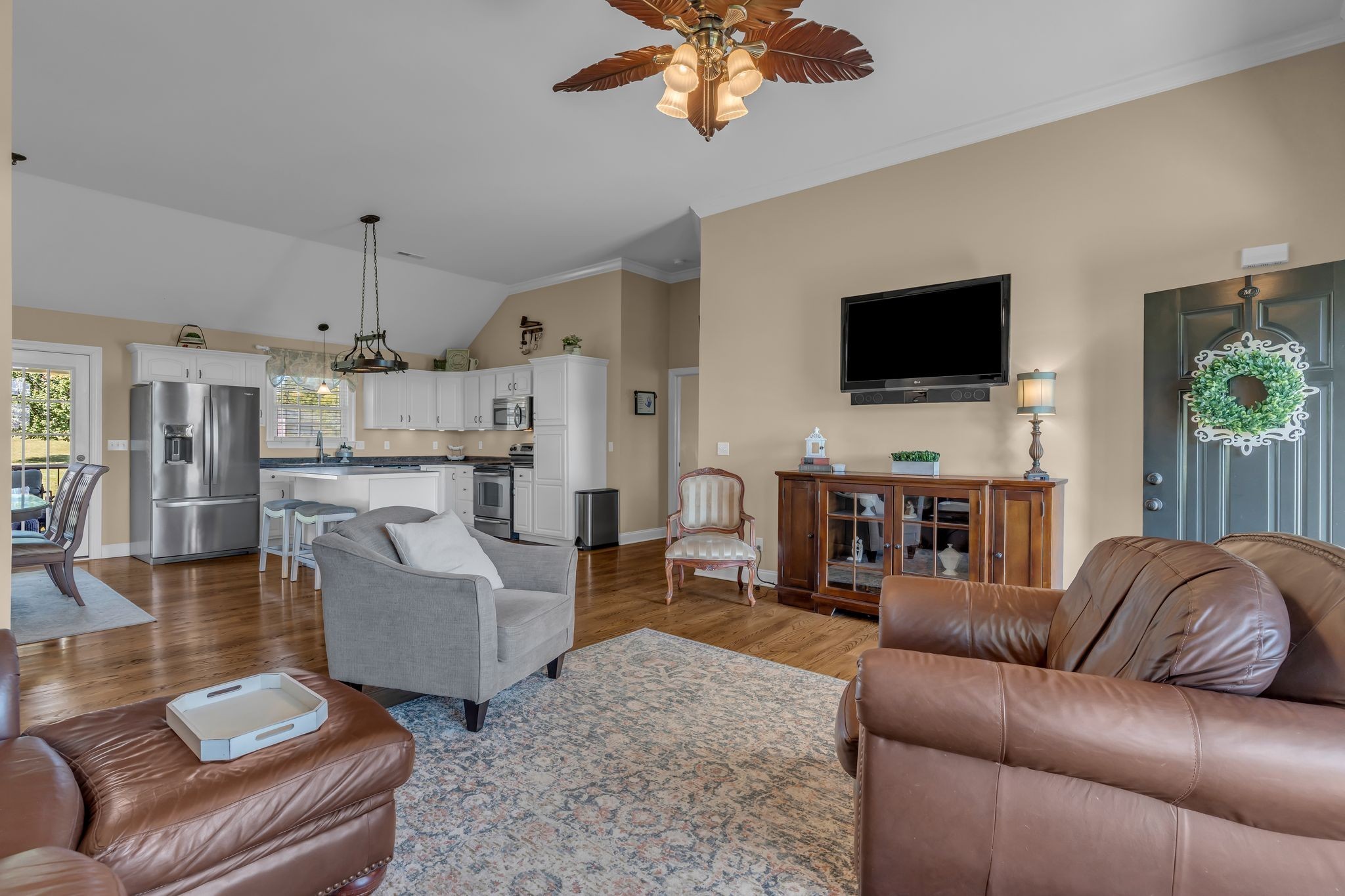 1688 Porter Road Bon Aqua, TN 37025 - Photo 7 of 38 a living room with furniture and a flat screen tv