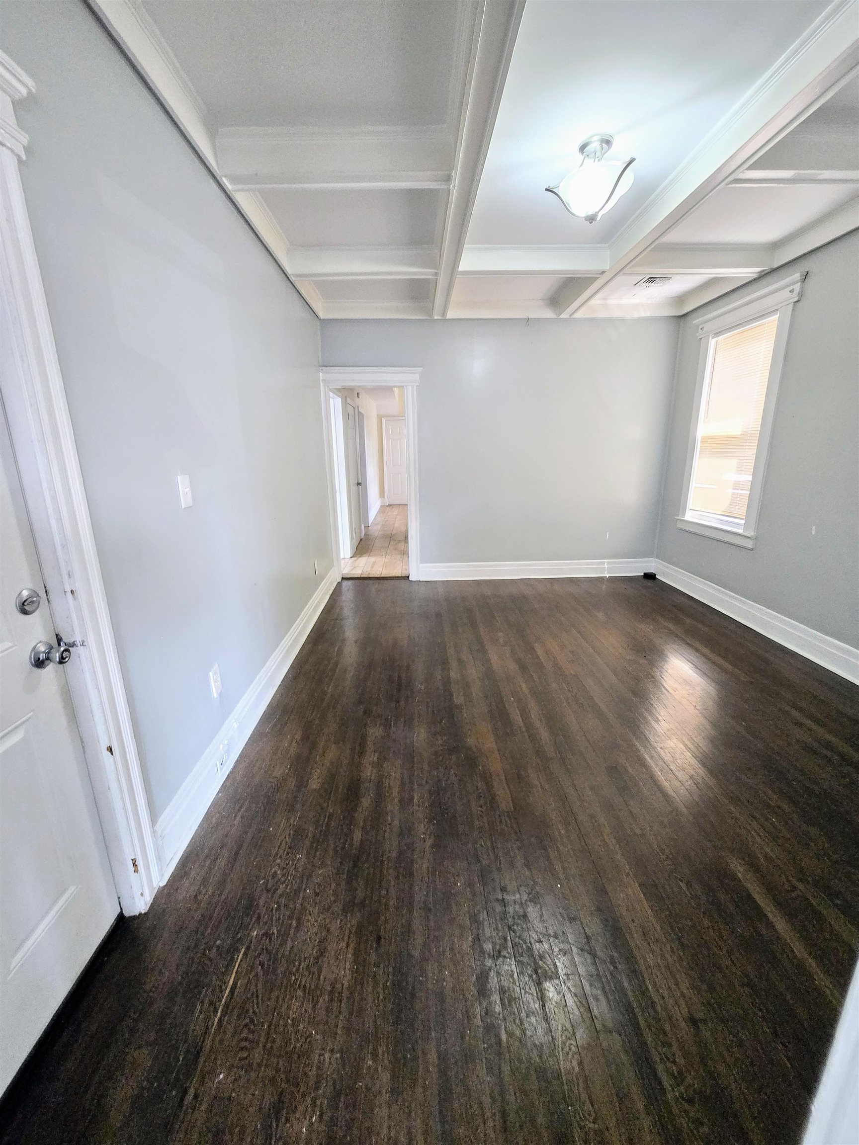 316 Devon Street, Unit 2 Kearny, NJ 07032 - Photo 3 of 9 wooden floor in an empty room with a window