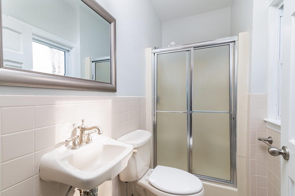 36 Cherry Street Whitman, MA 02382 - Photo 13 of 35 a bathroom with a sink toilet and shower