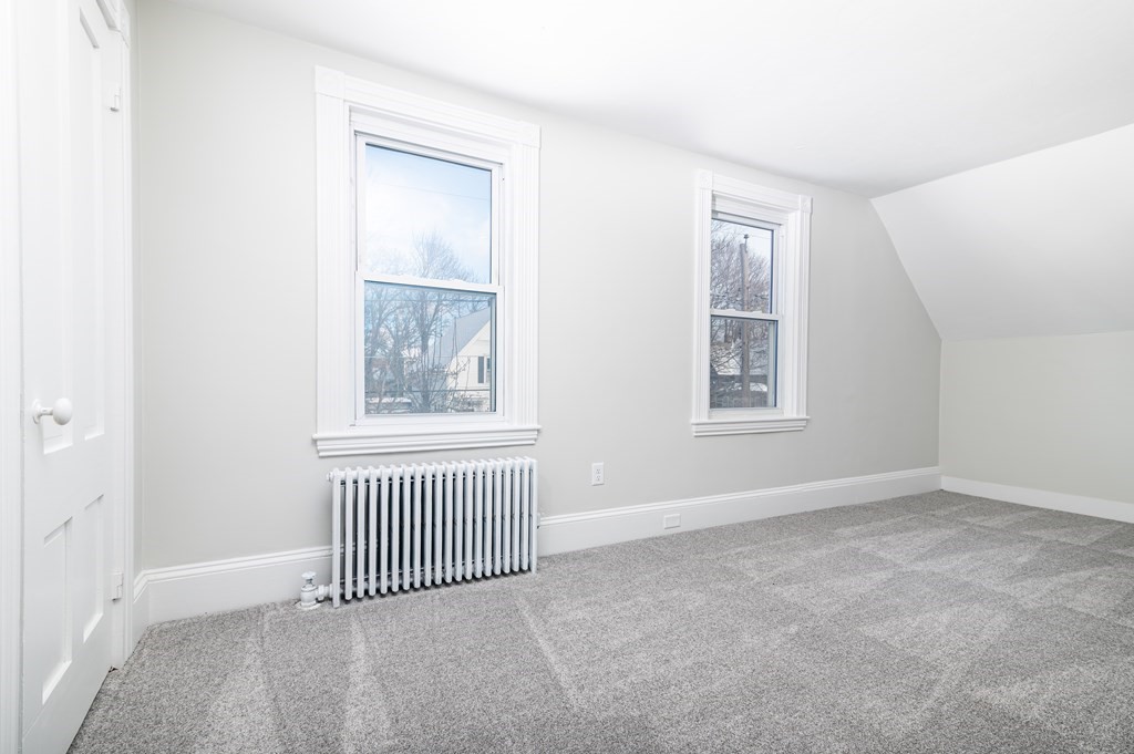 36 Cherry Street Whitman, MA 02382 - Photo 14 of 35 an empty room with windows