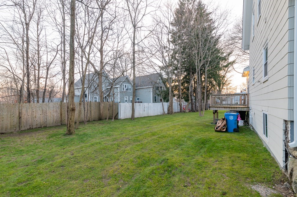 36 Cherry Street Whitman, MA 02382 - Photo 25 of 35 a view of an outdoor space with a garden