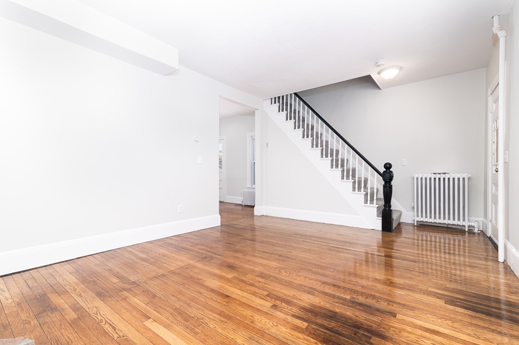 36 Cherry Street Whitman, MA 02382 - Photo 7 of 35 a view of an entryway with wooden floor