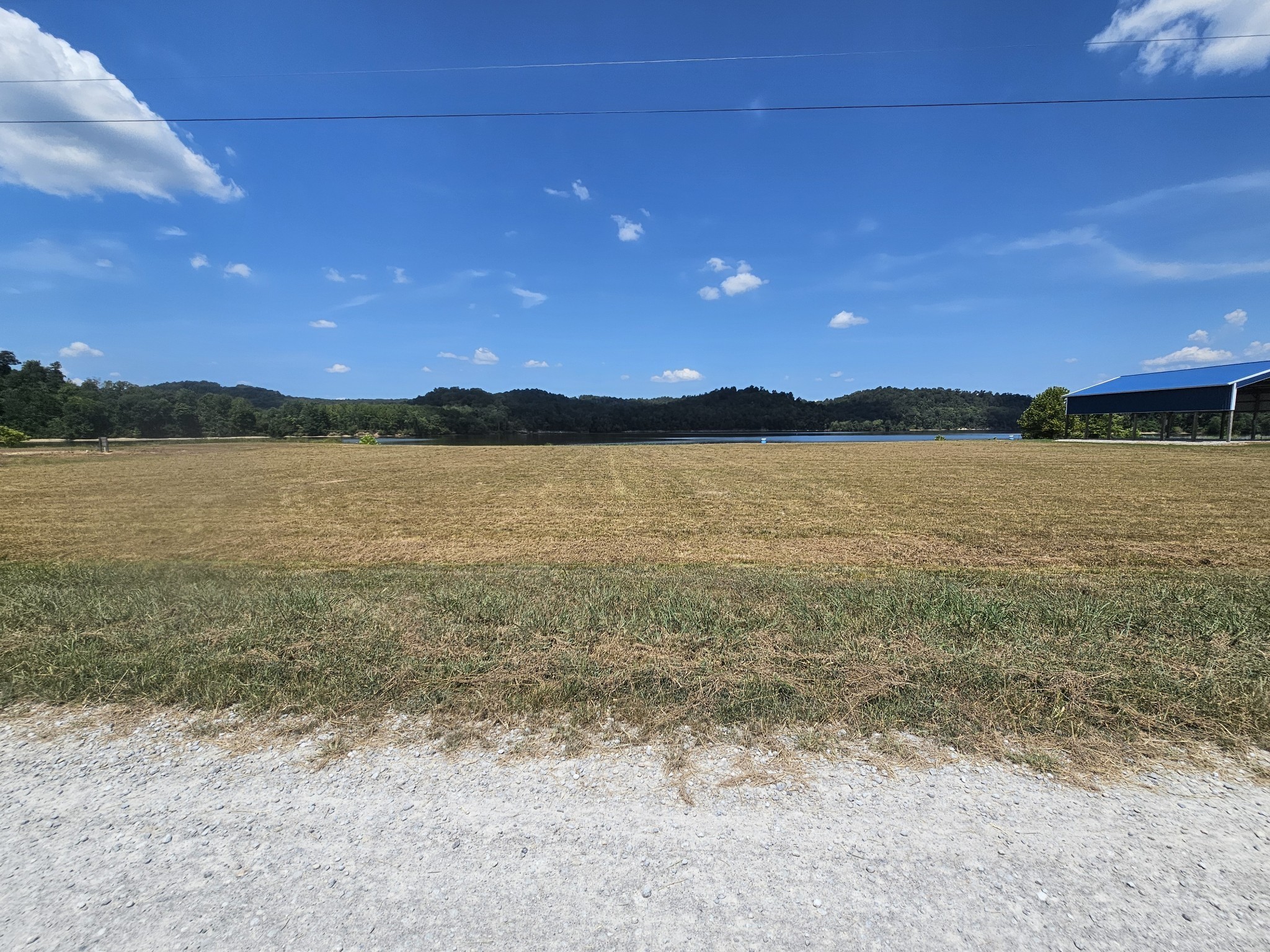 2427 Hardin Bottom River Road Clifton, TN 38425 - Photo 6 of 31 a view of an ocean beach and mountain
