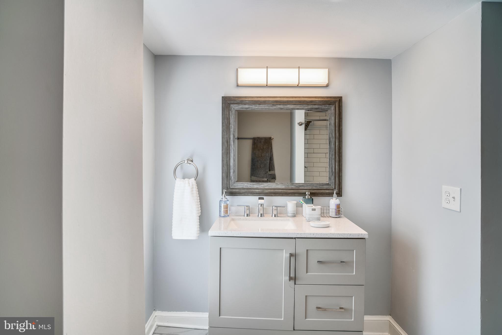 5320 Turkey Run Road Warrenton, VA 20187 - Photo 14 of 29 a bathroom with a sink and a mirror