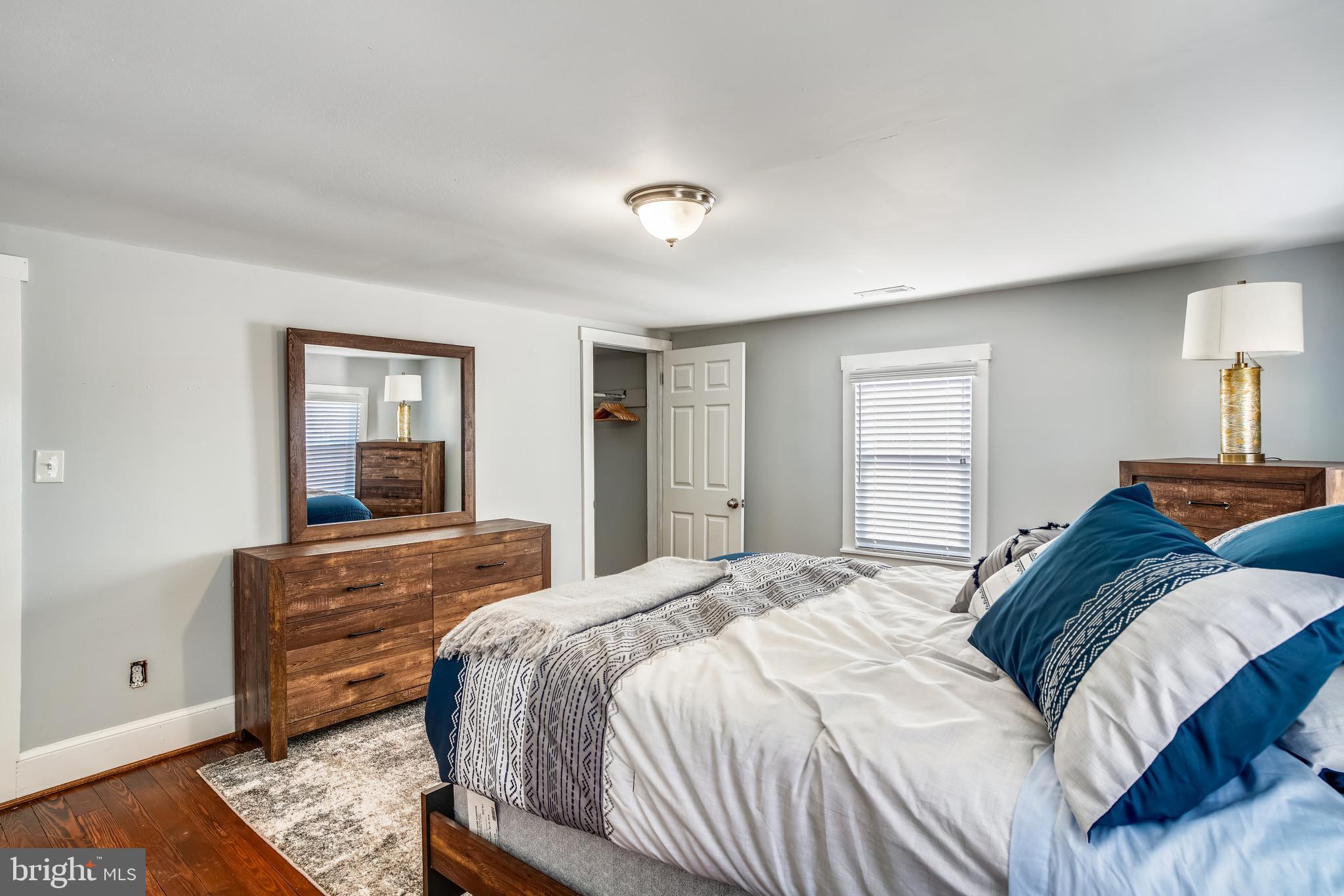 5320 Turkey Run Road Warrenton, VA 20187 - Photo 16 of 29 a bedroom with a bed and wooden floor