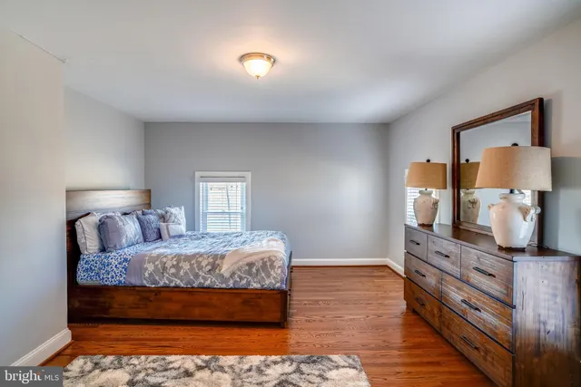 a bedroom with a bed and furniture