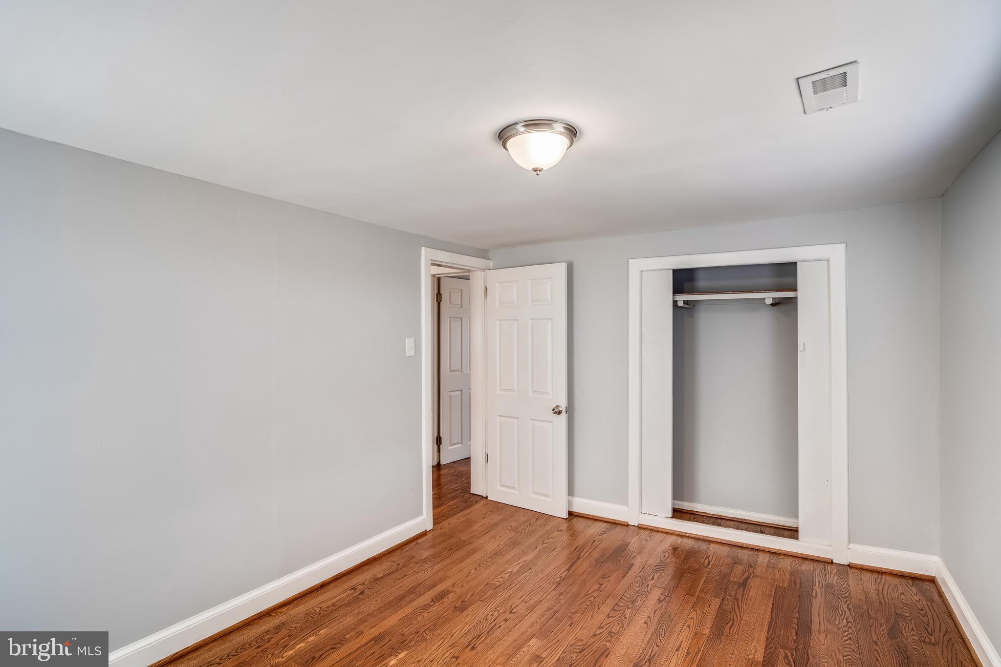 5320 Turkey Run Road Warrenton, VA 20187 - Photo 22 of 29 a view of an empty room with wooden floor