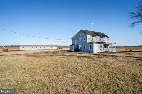a view of a house with a big yard