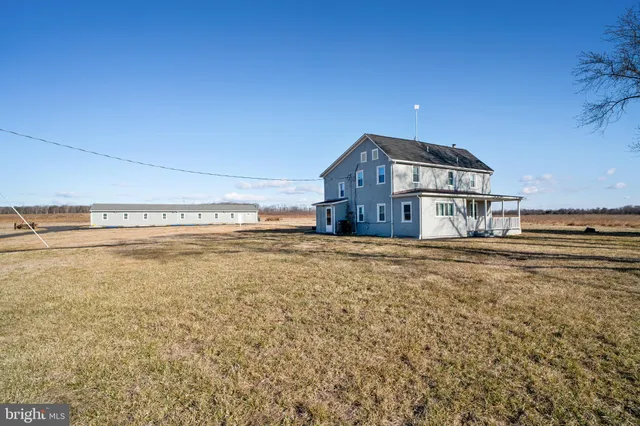 a view of a house with a big yard