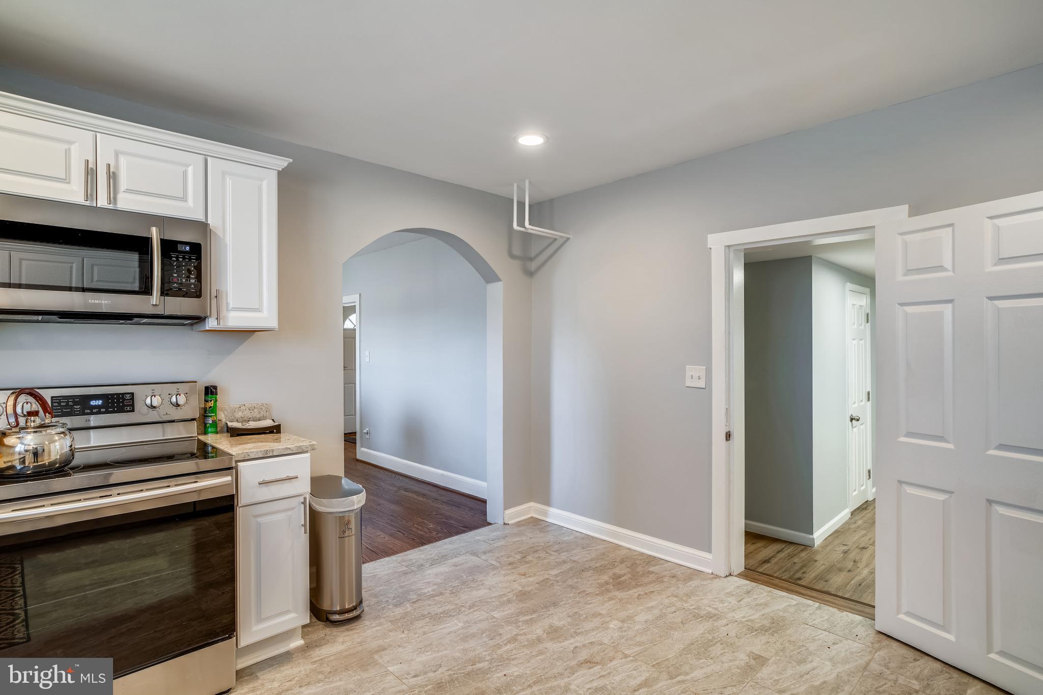5320 Turkey Run Road Warrenton, VA 20187 - Photo 6 of 29 a kitchen with stainless steel appliances granite countertop a stove and a microwave