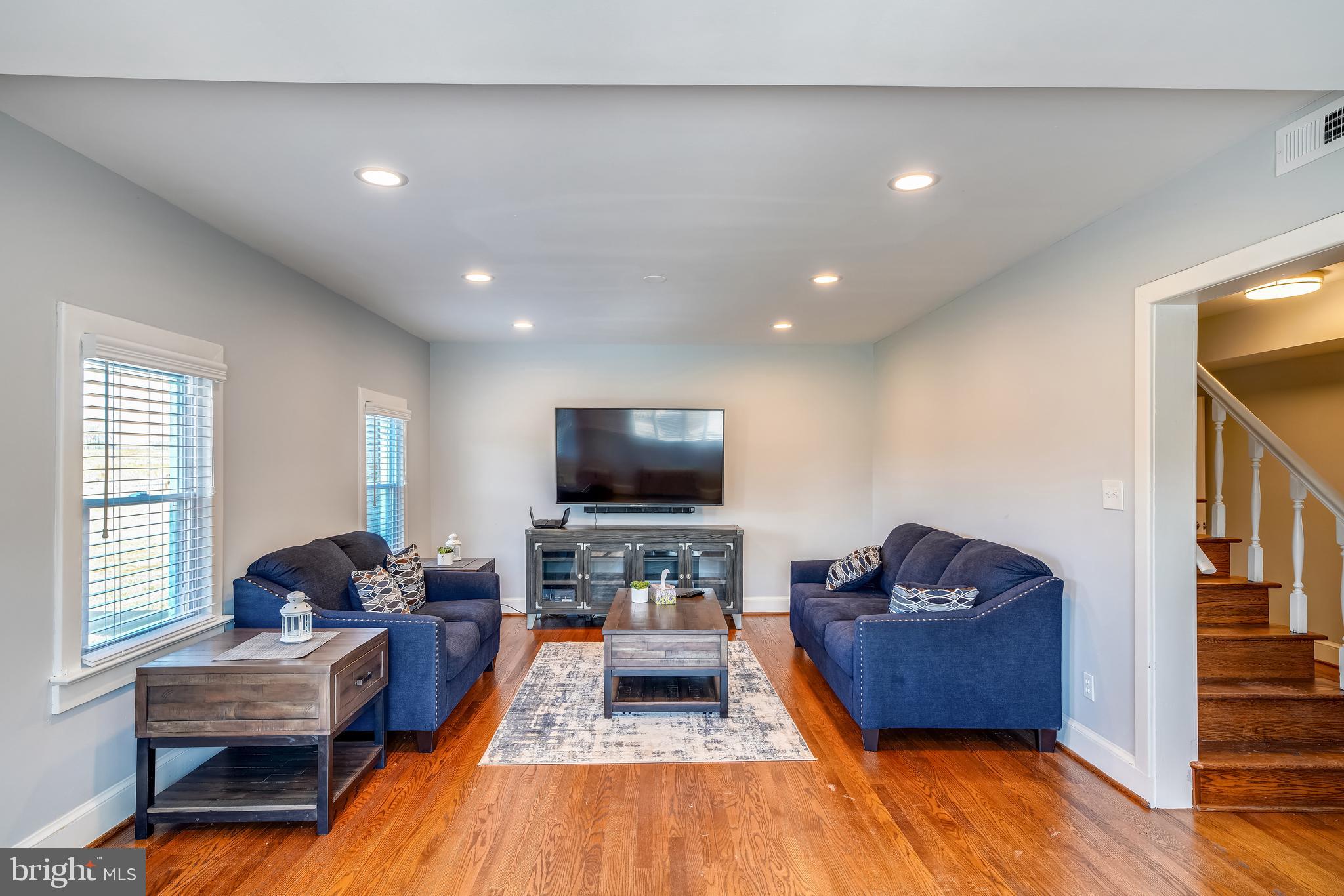 5320 Turkey Run Road Warrenton, VA 20187 - Photo 7 of 29 a living room with furniture and a flat screen tv