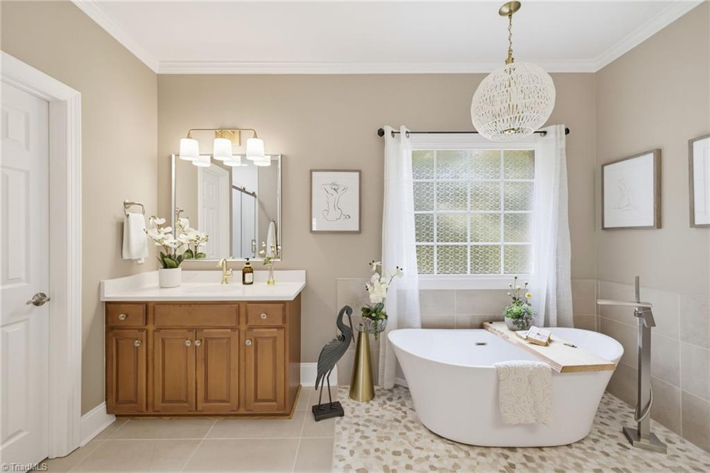 5411 Effieham Street Oak Ridge, NC 27310 - Photo 20 of 49 Dual vanities in primary suite