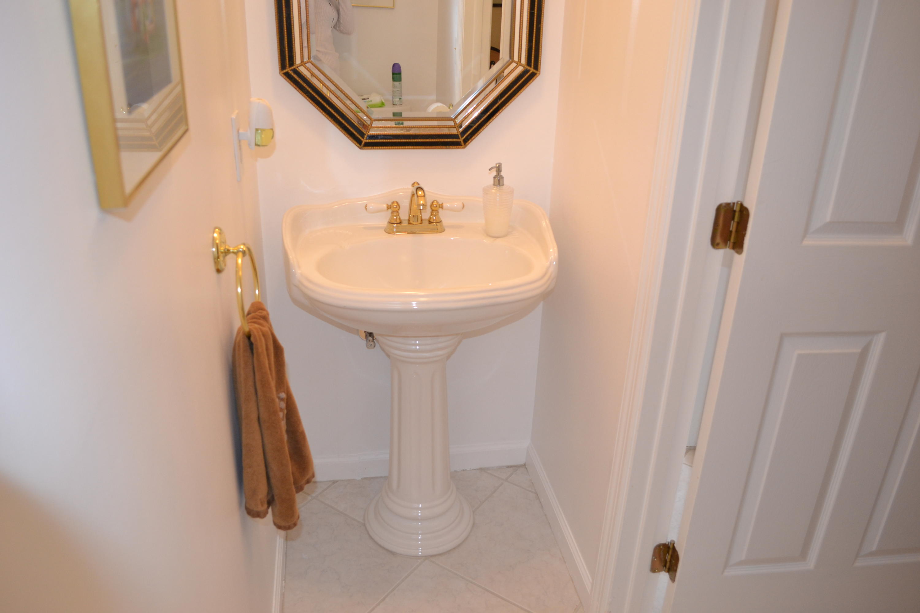 1342 Northwest 13th Court Boca Raton, FL 33486 - Photo 6 of 25 Foyer Half Bath
