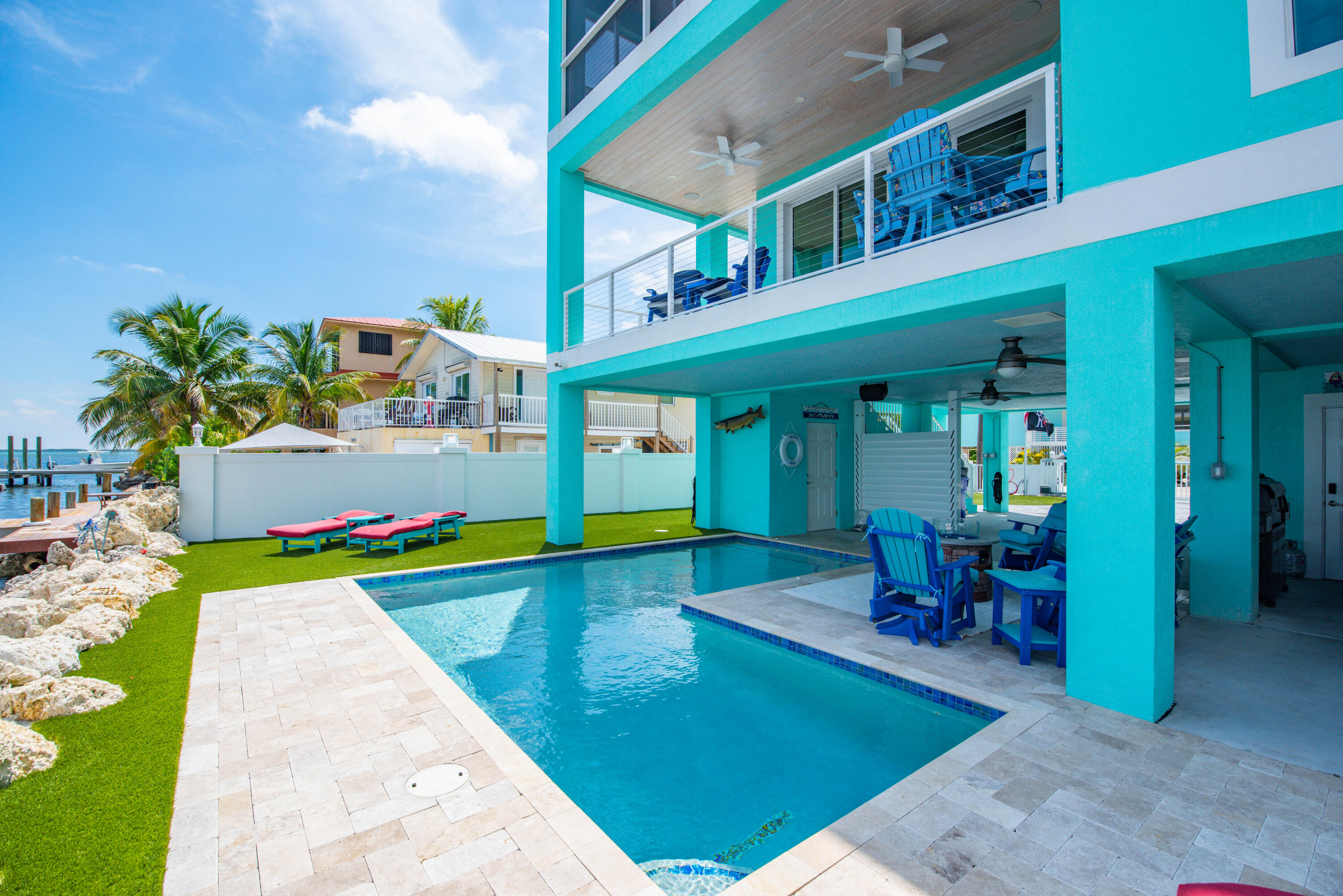 747 La Fitte Road Summerland Key, FL 33042 - Photo 48 of 103 a view of an house with swimming pool patio and outdoor seating