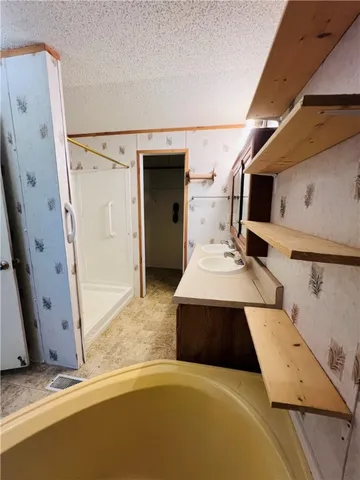 a view of a room with rack on the wall