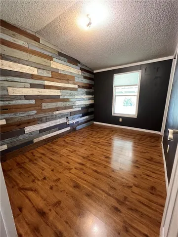 a bathroom with a sink a toilet and a shower