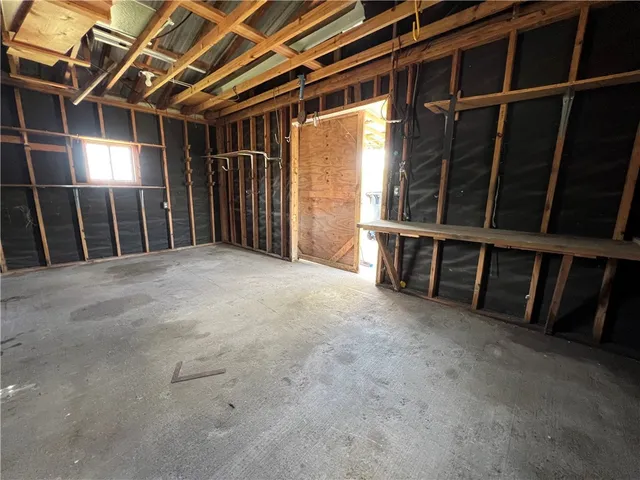 a view of a backyard with a tub