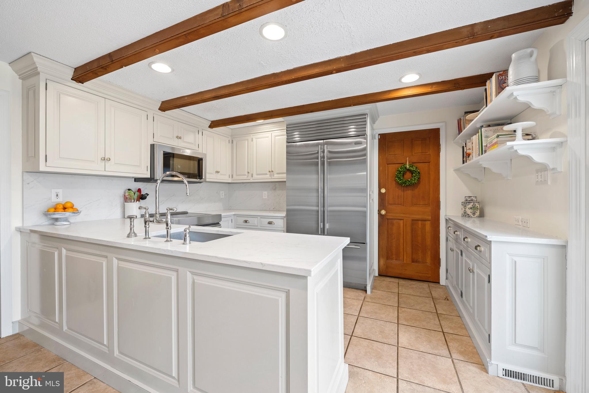 445 Upper Weadley Road Wayne, PA 19087 - Photo 17 of 36 Kitchen w/garage access