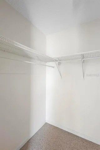 a view of a room with racks on the wall