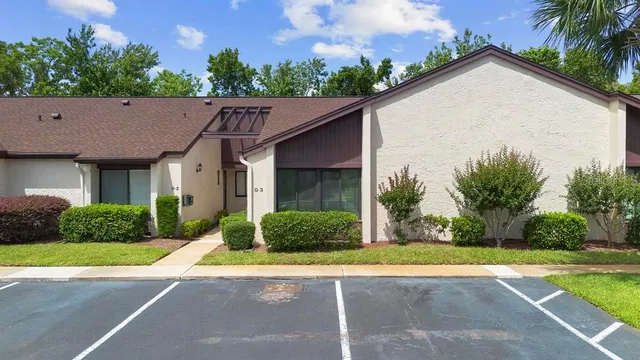 a view of a yard in front of a house