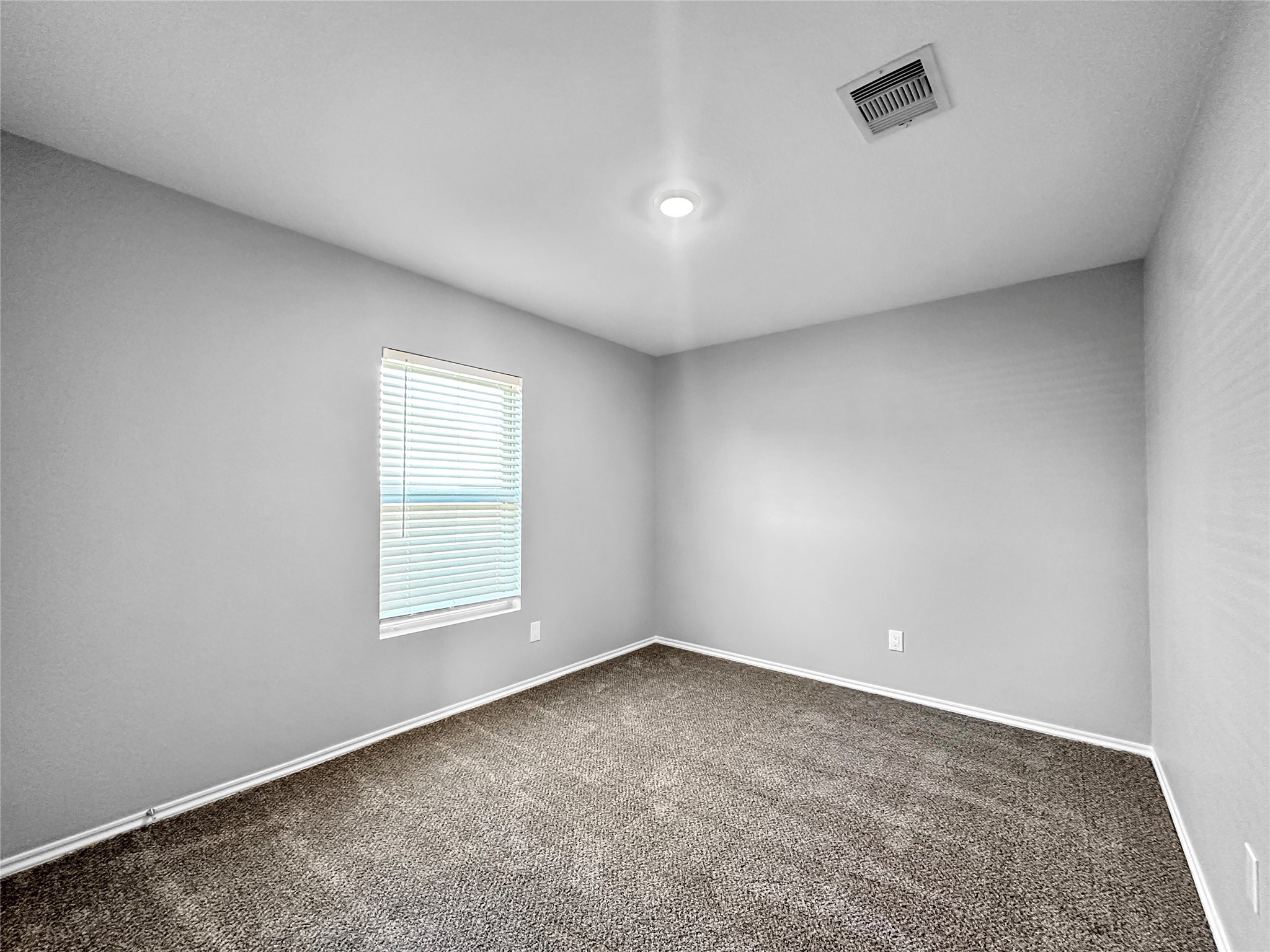 937 Silver Birch Branch Magnolia, TX 77354 - Photo 11 of 19 an empty room with a window