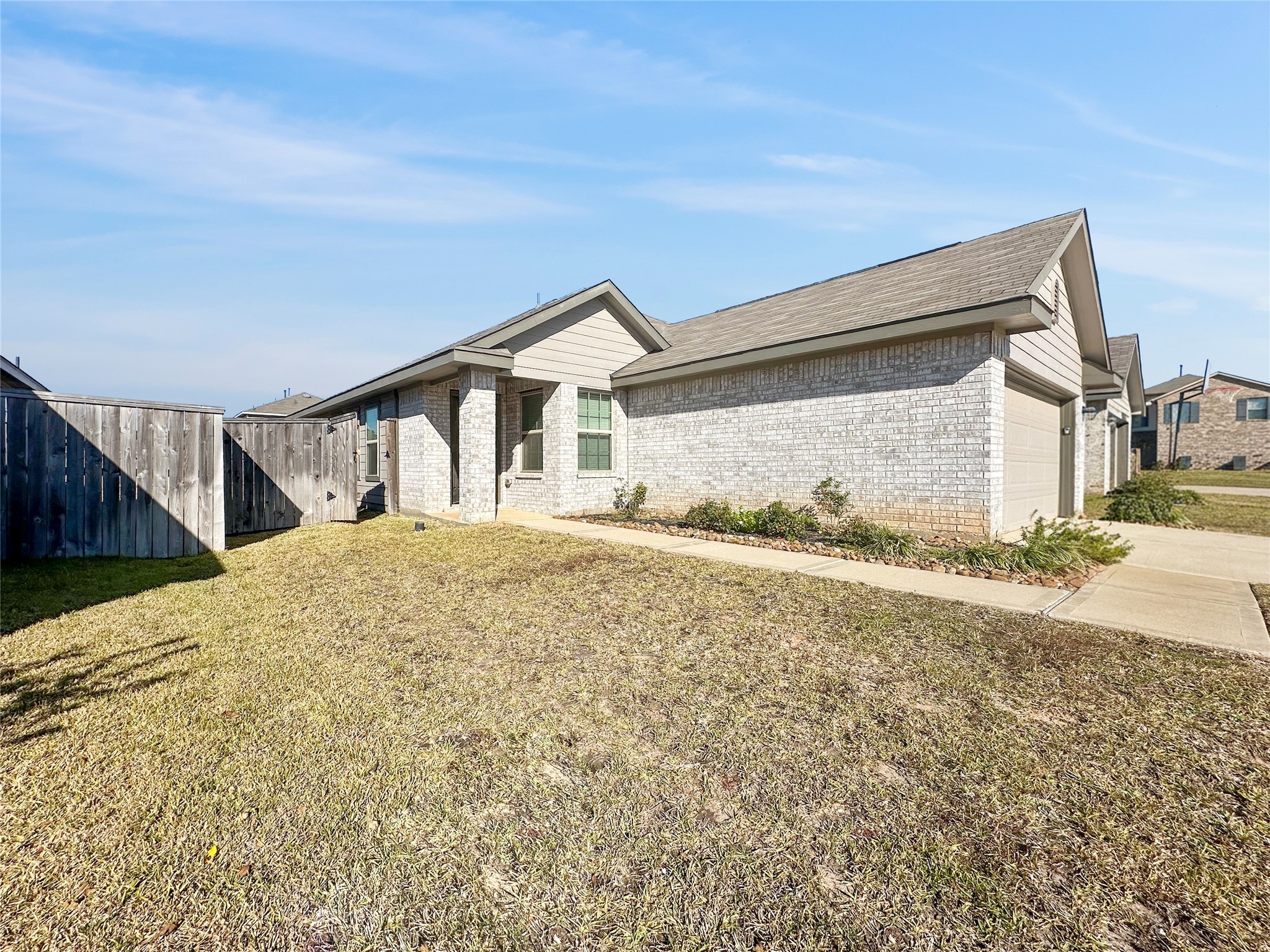 937 Silver Birch Branch Magnolia, TX 77354 - Photo 2 of 19 a view of a house with a snow on the road