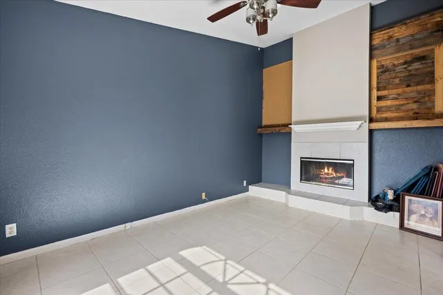 a view of an empty room and window