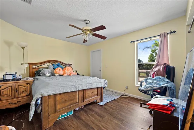 a kitchen with a refrigerator and a sink