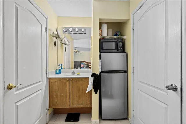 a bathroom with a shower a toilet and a shower