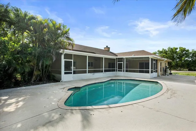 a view of a lake with a yard