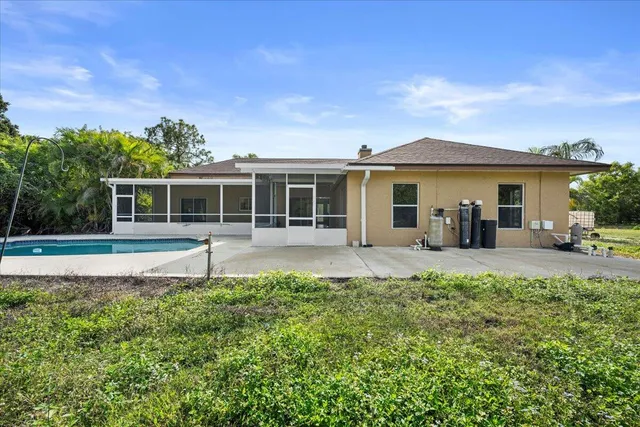 a house with trees in front of it