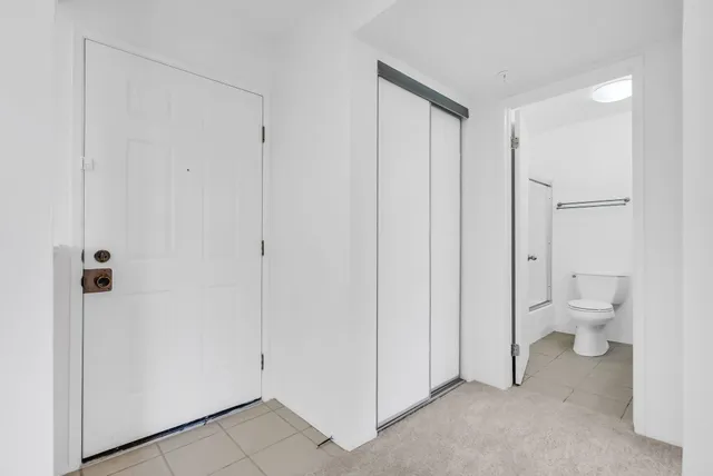 a bathroom with a toilet sink