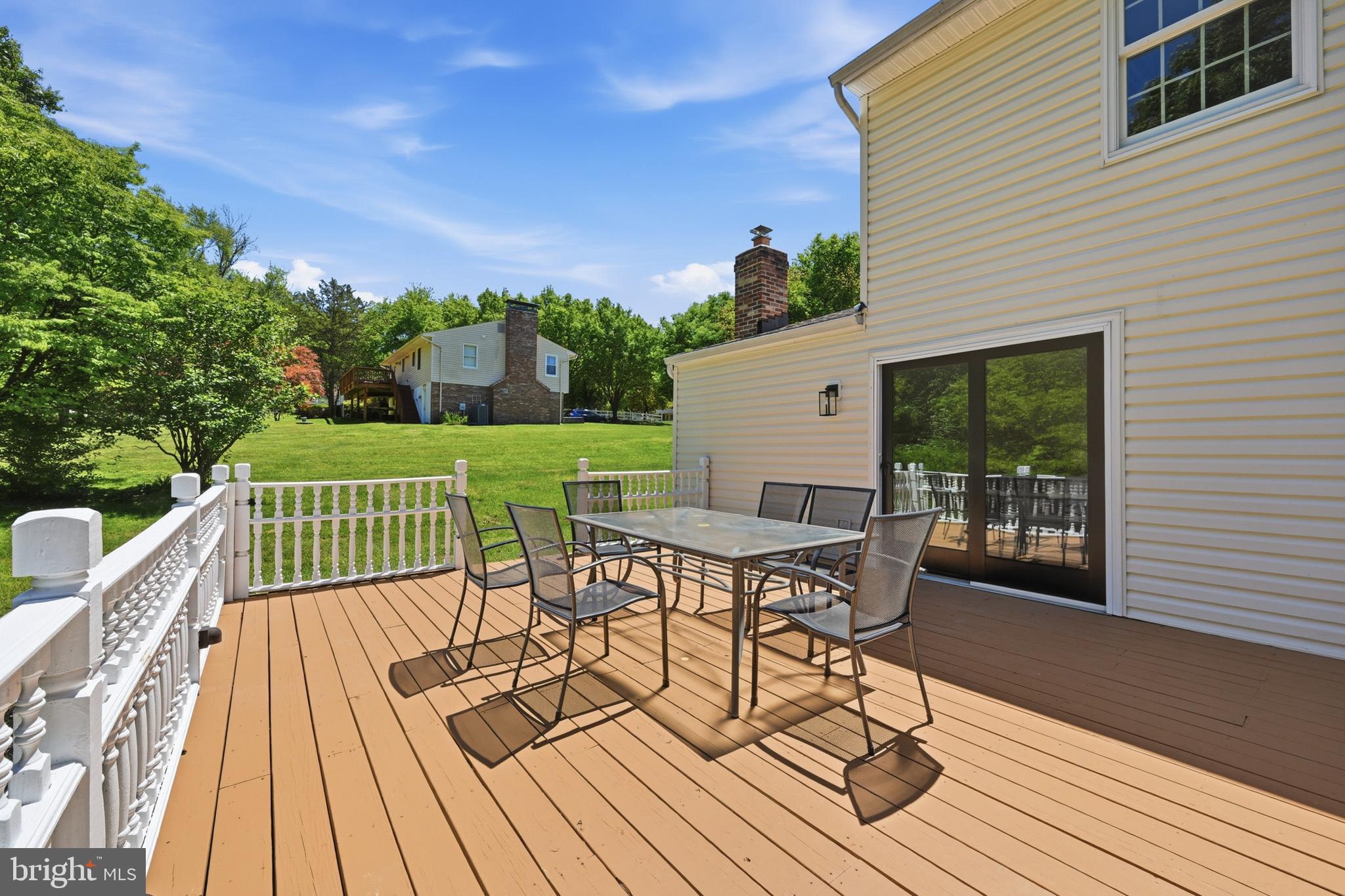 1527 Everlea Road Marriottsville, MD 21104 - Photo 54 of 70 Expansive deck with wooded back drop