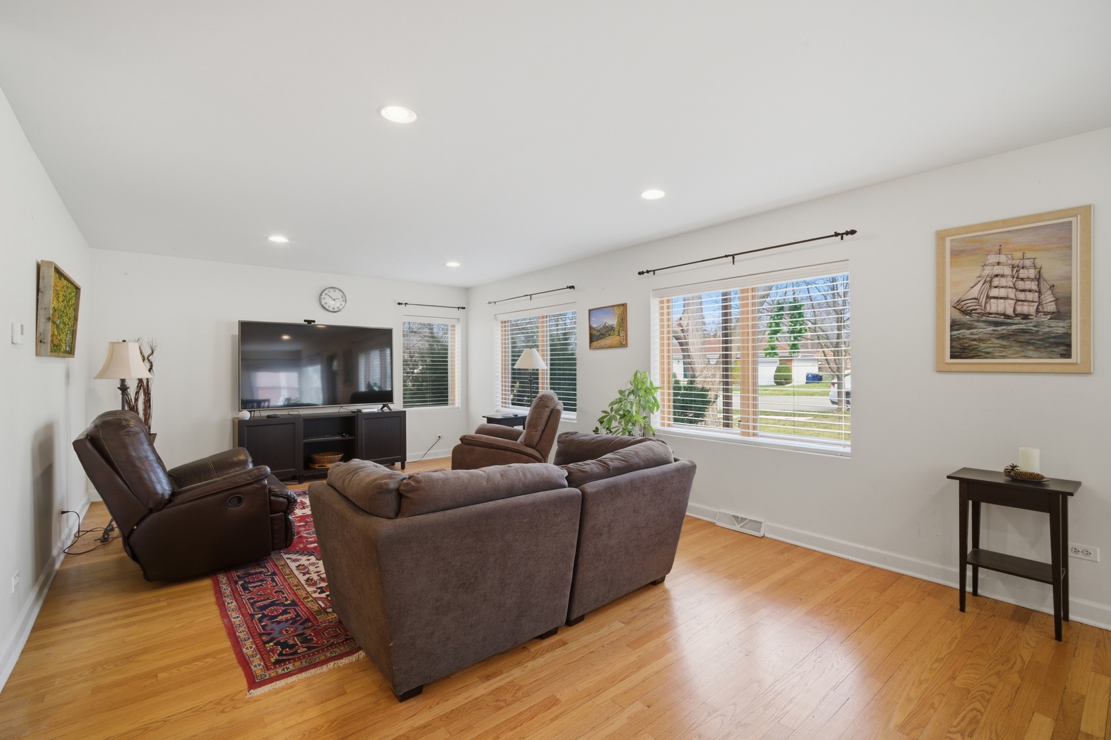 1917 Kiest Avenue Northbrook, IL 60062 - Photo 11 of 27 a living room with furniture a flat screen tv and wooden floor