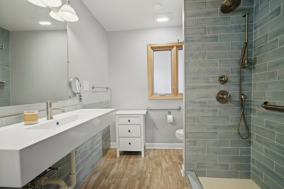 1917 Kiest Avenue Northbrook, IL 60062 - Photo 19 of 27 a bathroom with a double vanity sink a mirror and shower