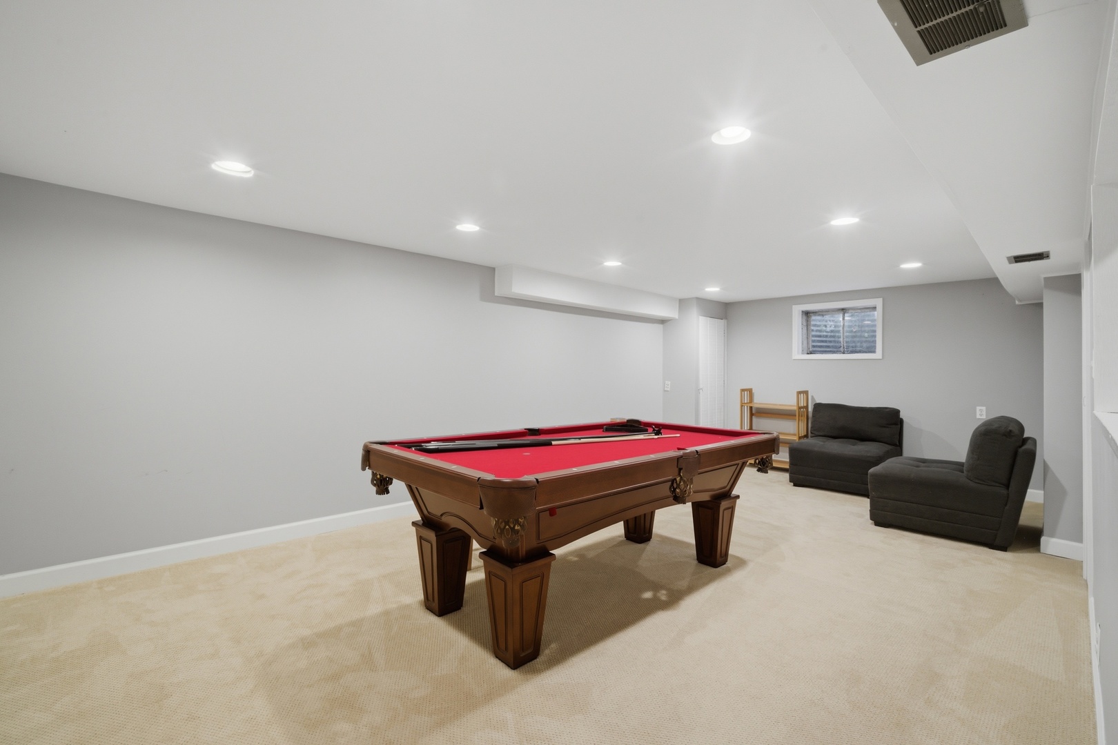 1917 Kiest Avenue Northbrook, IL 60062 - Photo 23 of 27 a living room with a couch and a flat screen tv