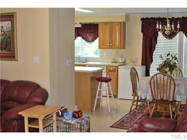2445 Zacks Mill Road Angier, NC 27501 - Photo 5 of 15 a dining room with furniture and window