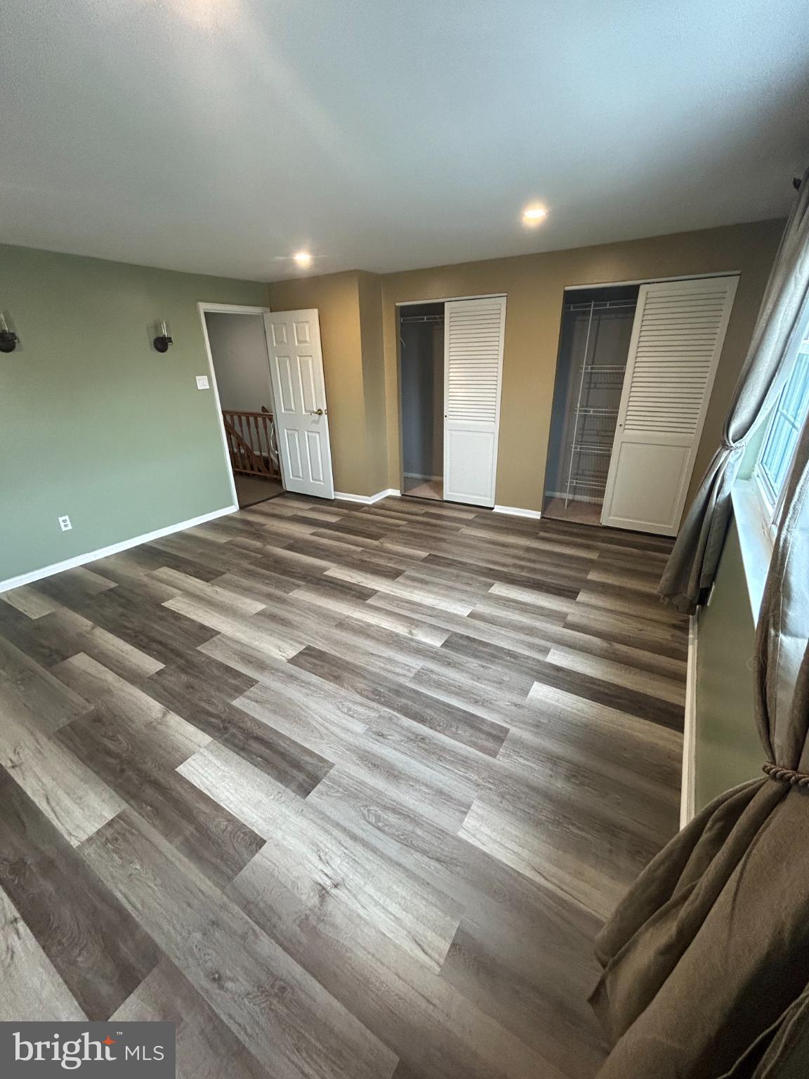 10830 Perrin Road Philadelphia, PA 19154 - Photo 14 of 25 a view of empty room with wooden floor
