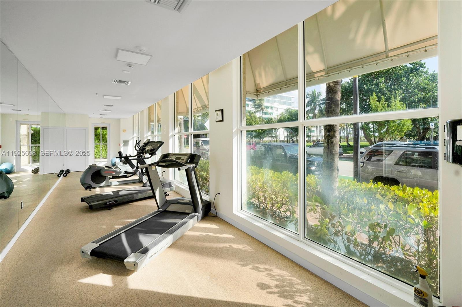 225 Collins Avenue, Unit 6J Miami Beach, FL 33139 - Photo 49 of 49 a view of a room with gym equipment