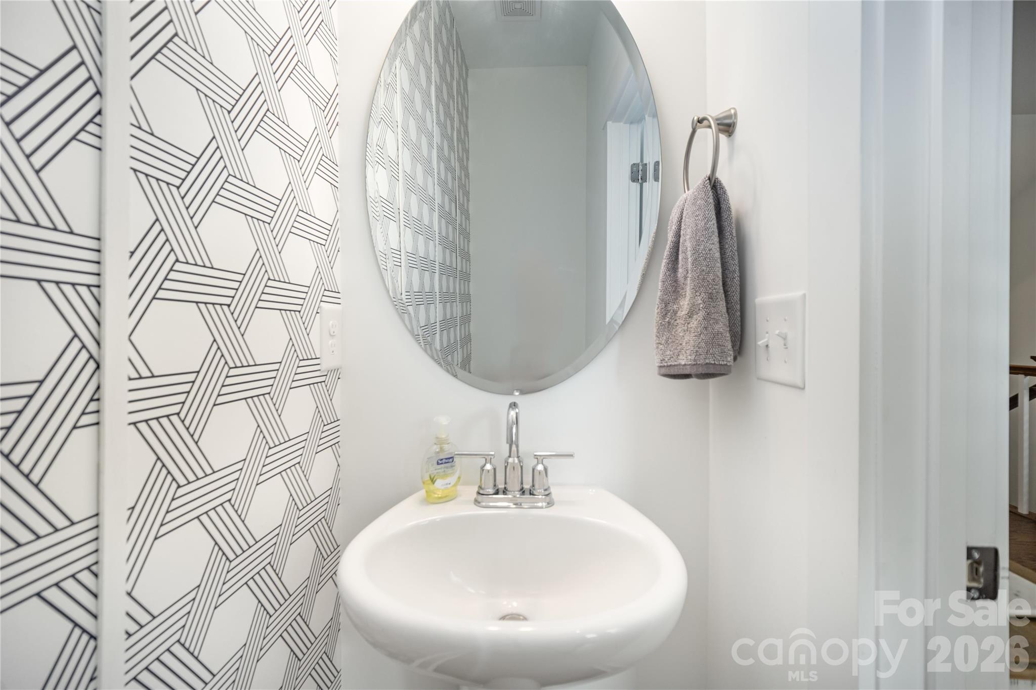 4004 Capital Ridge Charlotte, NC 28205 - Photo 14 of 30 a bathroom with a sink and a mirror