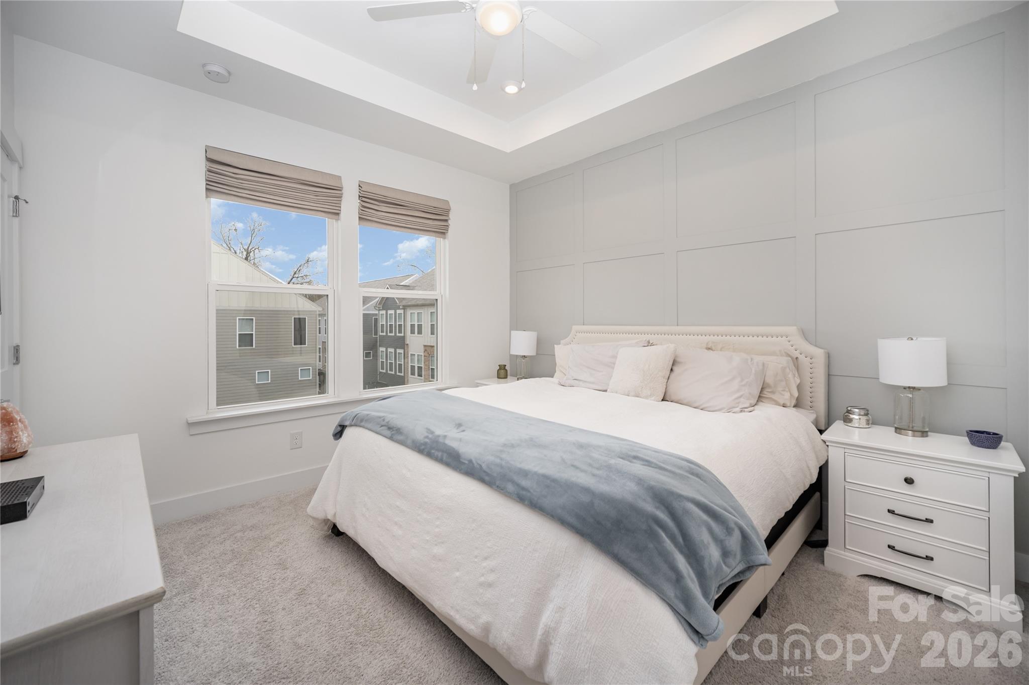 4004 Capital Ridge Charlotte, NC 28205 - Photo 15 of 30 a bedroom with a large bed and a window