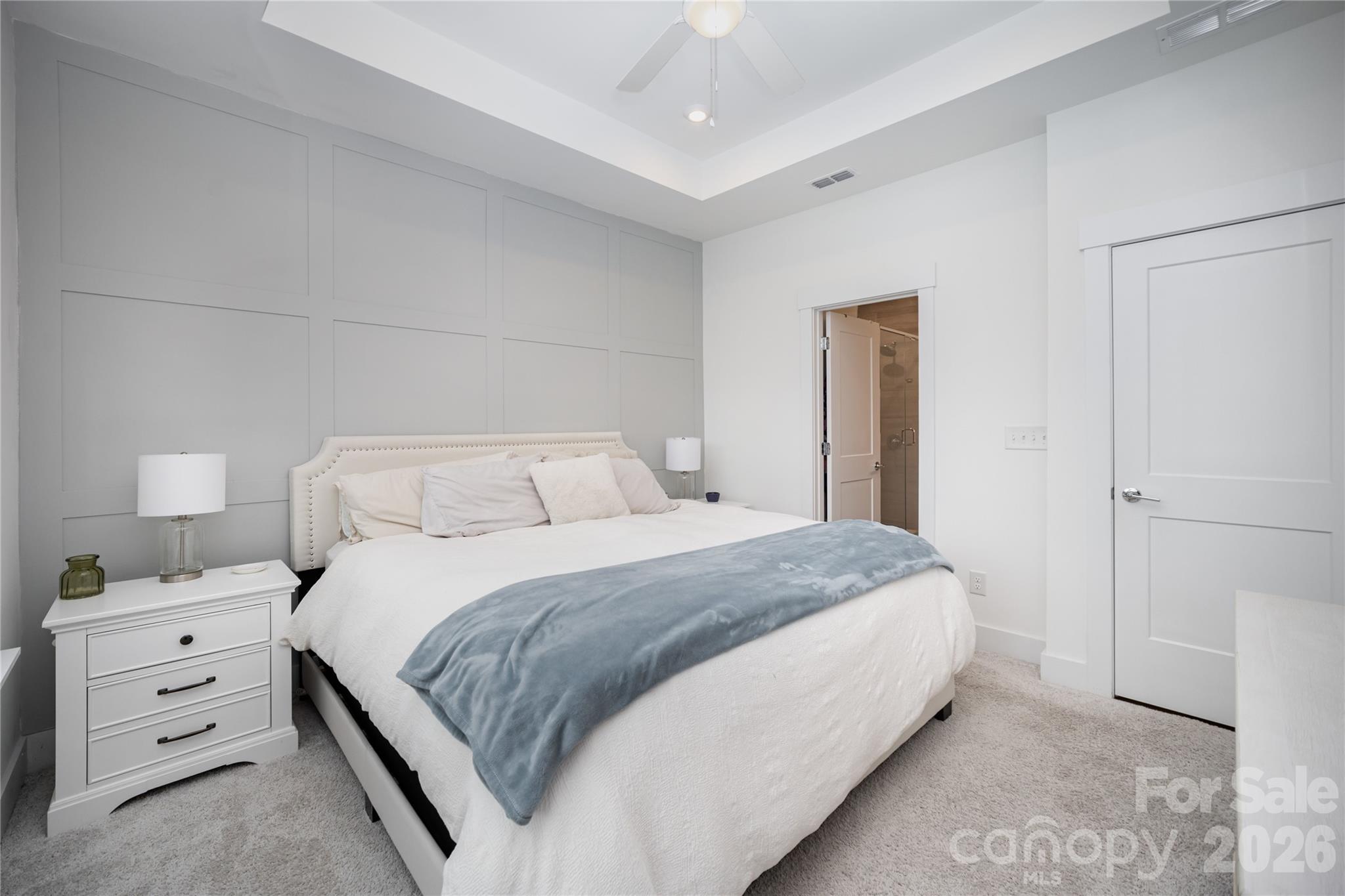 4004 Capital Ridge Charlotte, NC 28205 - Photo 17 of 30 a bedroom with a bed and a night stand