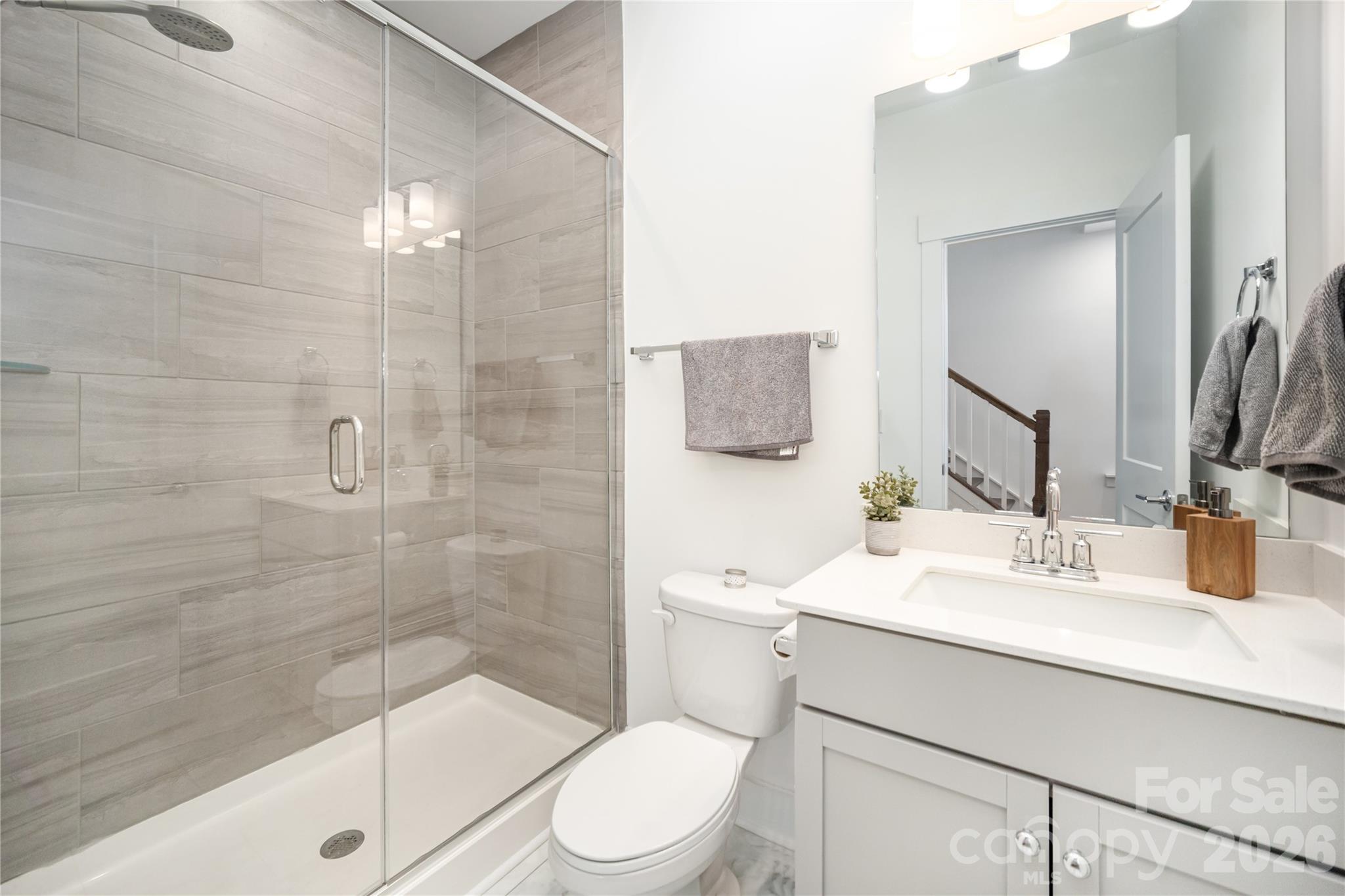 4004 Capital Ridge Charlotte, NC 28205 - Photo 24 of 30 a bathroom with a sink a toilet and shower