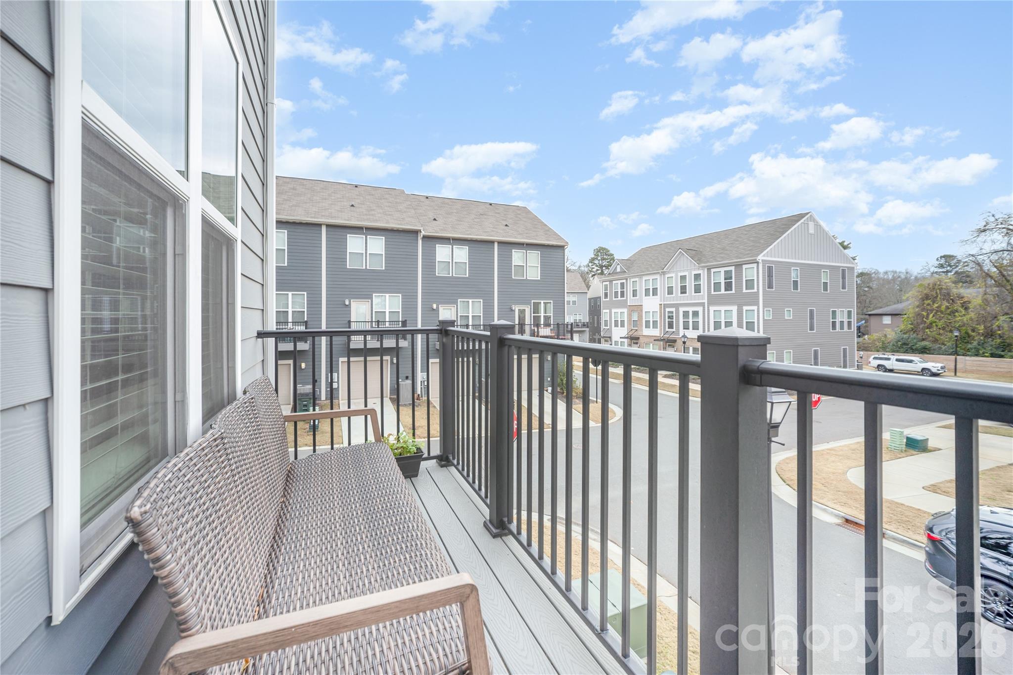 4004 Capital Ridge Charlotte, NC 28205 - Photo 26 of 30 a view of a brick house with a roof deck