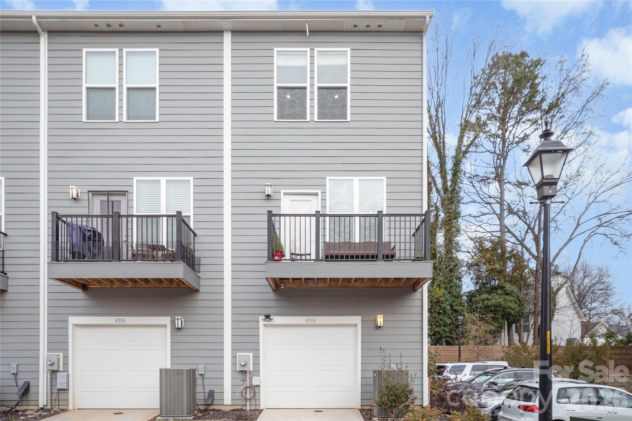 4004 Capital Ridge Charlotte, NC 28205 - Photo 27 of 30 a front view of a house with a tree