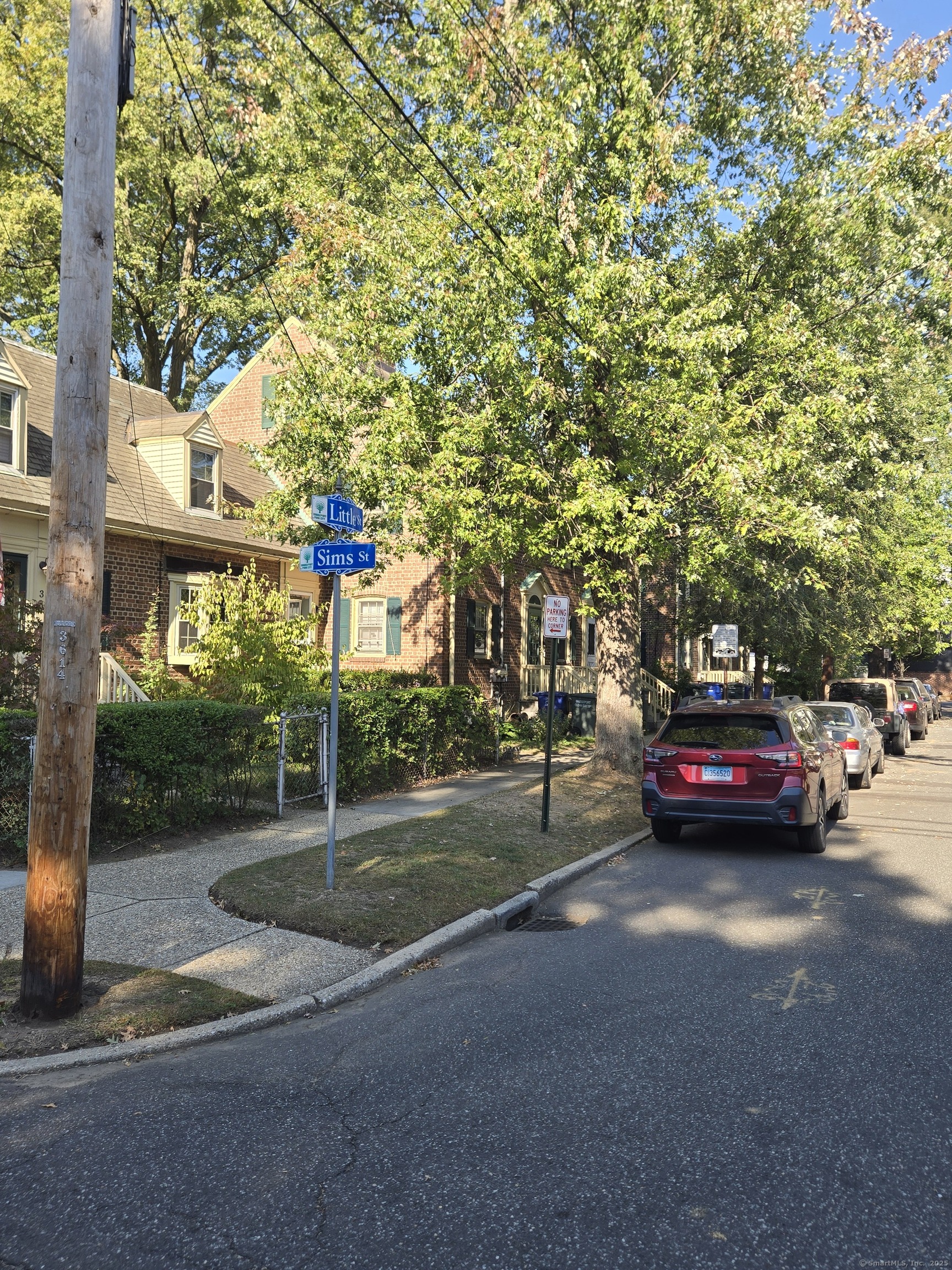 21 Little Street Bridgeport, CT 06604 - Photo 2 of 12 a view of street with parked cars