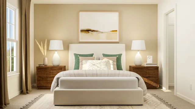 a bedroom with a bed and a night stand