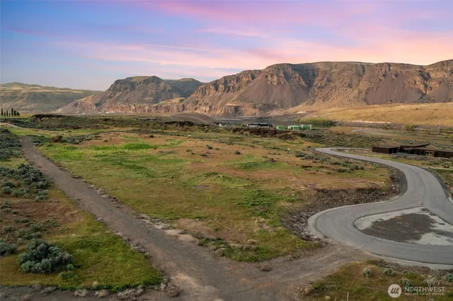 a view of an ocean and a mountain